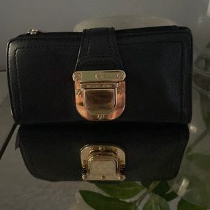 Michael kors black leather wallet.